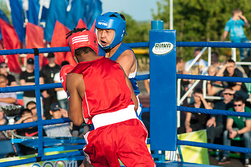 Image showing A boxing match Javier Ibanez, Cuba and Malik Bajtleuov, Russia. Defeated Javier Ibanez