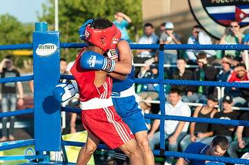 Image showing A boxing match Javier Ibanez, Cuba and Malik Bajtleuov, Russia. Defeated Javier Ibanez