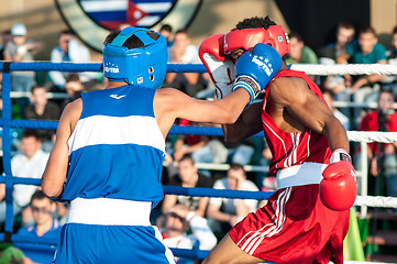 Image showing A boxing match Javier Ibanez, Cuba and Malik Bajtleuov, Russia. Defeated Javier Ibanez