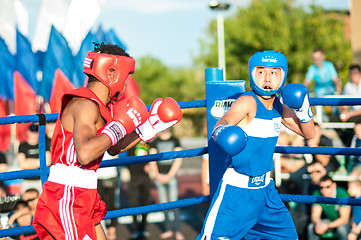 Image showing A boxing match Javier Ibanez, Cuba and Malik Bajtleuov, Russia. Defeated Javier Ibanez