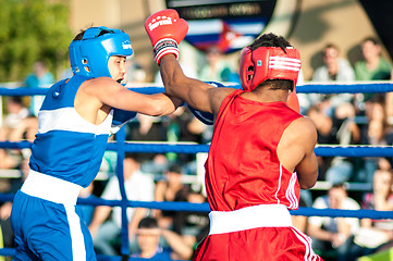 Image showing A boxing match Javier Ibanez, Cuba and Malik Bajtleuov, Russia. Defeated Javier Ibanez