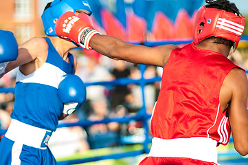 Image showing A boxing match Javier Ibanez, Cuba and Malik Bajtleuov, Russia. Defeated Javier Ibanez