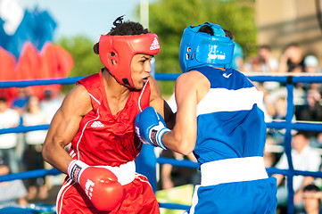 Image showing A boxing match Javier Ibanez, Cuba and Malik Bajtleuov, Russia. Defeated Javier Ibanez