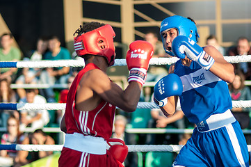 Image showing A boxing match Javier Ibanez, Cuba and Malik Bajtleuov, Russia. Defeated Javier Ibanez