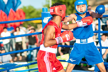 Image showing A boxing match Javier Ibanez, Cuba and Malik Bajtleuov, Russia. Defeated Javier Ibanez