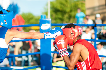 Image showing A boxing match Javier Ibanez, Cuba and Malik Bajtleuov, Russia. Defeated Javier Ibanez