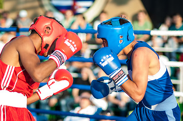 Image showing A boxing match Javier Ibanez, Cuba and Malik Bajtleuov, Russia. Defeated Javier Ibanez