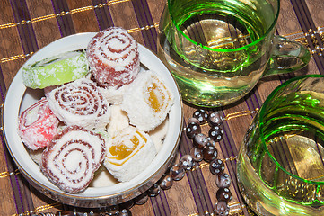 Image showing Turkish delight and a glass of refreshing drink
