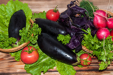 Image showing Eggplant and fresh herbs