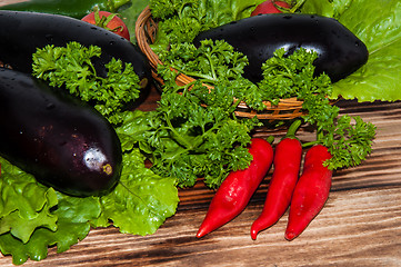 Image showing Eggplant and fresh herbs