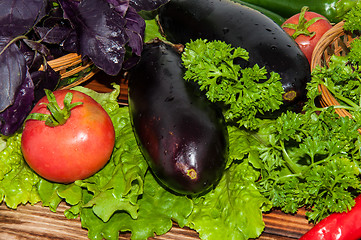 Image showing Eggplant and fresh herbs