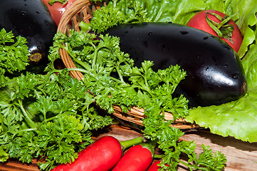 Image showing Eggplant and fresh herbs