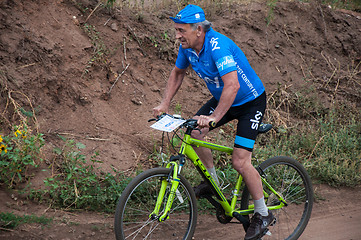 Image showing Competitions cyclists in cross-country 