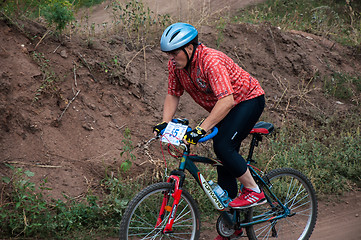 Image showing Competitions cyclists in cross-country 