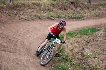 Image showing Competitions cyclists in cross-country 