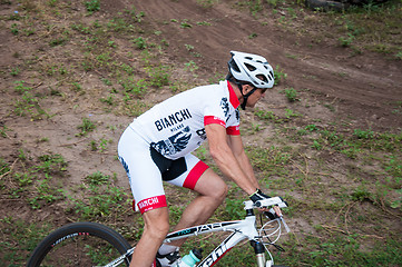 Image showing Competitions cyclists in cross-country 