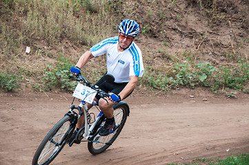 Image showing Competitions cyclists in cross-country 