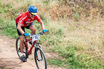 Image showing Competitions cyclists in cross-country 