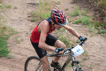Image showing Competitions cyclists in cross-country 