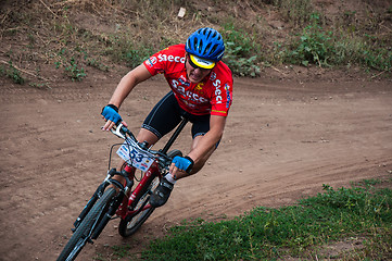 Image showing Competitions cyclists in cross-country 