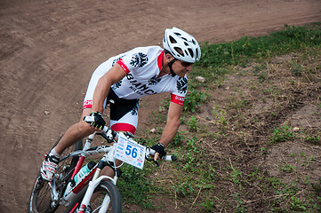 Image showing Competitions cyclists in cross-country 