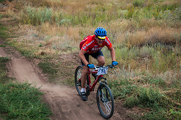 Image showing Competitions cyclists in cross-country 