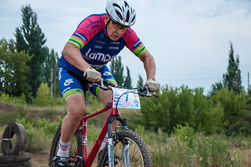 Image showing Competitions cyclists in cross-country 