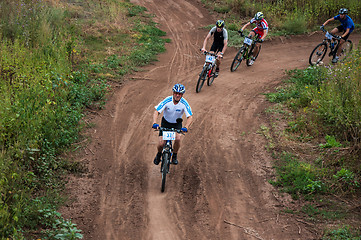 Image showing Competitions cyclists in cross-country 