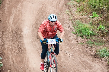 Image showing Competitions cyclists in cross-country 