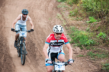 Image showing Competitions cyclists in cross-country 