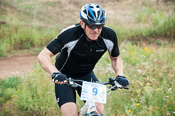 Image showing Competitions cyclists in cross-country 