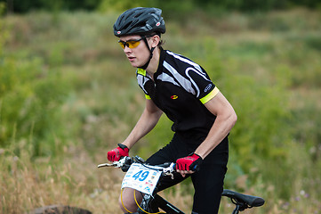 Image showing Competitions cyclists in cross-country 