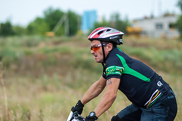 Image showing Competitions cyclists in cross-country 