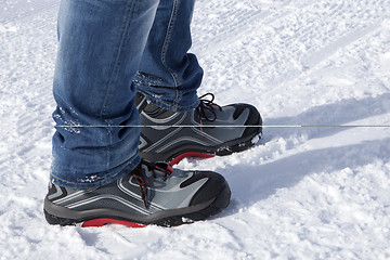 Image showing Safety shoes in the snowy mountains