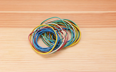 Image showing Small pile of coloured elastic bands