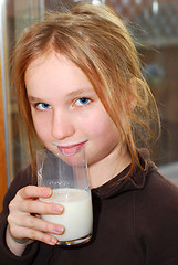 Image showing Girl and milk