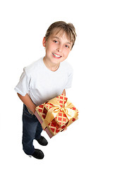 Image showing Child holding wrapped presents isolated