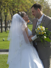 Image showing Embracing Just Married in Park