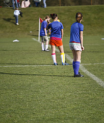 Image showing Girls Soccer Team Waits to Kick Off