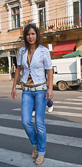 Image showing Woman crossing the street.