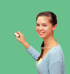 Image showing Girl schoolgirl meets an lesson on the background of the school 