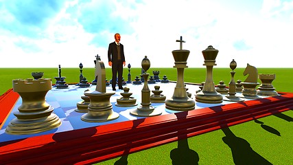 Image showing Businessman on chess board