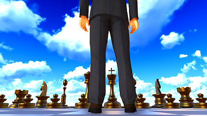 Image showing Businessman on chess board