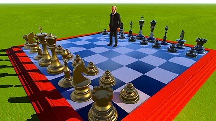 Image showing Businessman on chess board