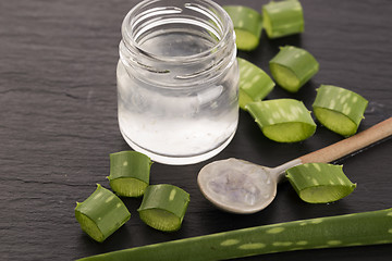 Image showing aloe vera juice with fresh leaves 