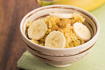 Image showing Fresh millet porridge with banana