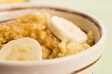 Image showing Fresh millet porridge with banana