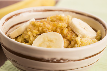 Image showing Fresh millet porridge with banana