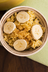 Image showing Fresh millet porridge with banana