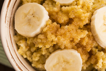 Image showing Fresh millet porridge with banana